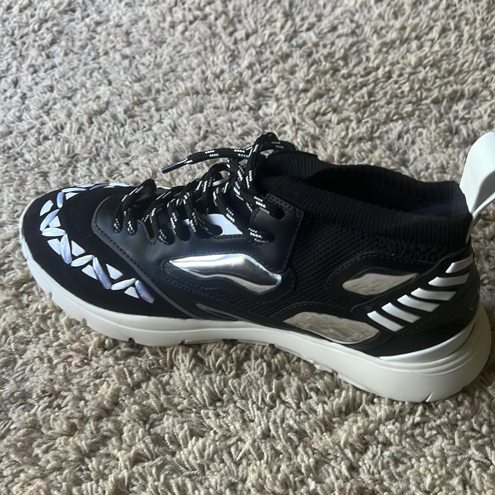 New Valentino that I bought for my son for his graduation and it is too tight